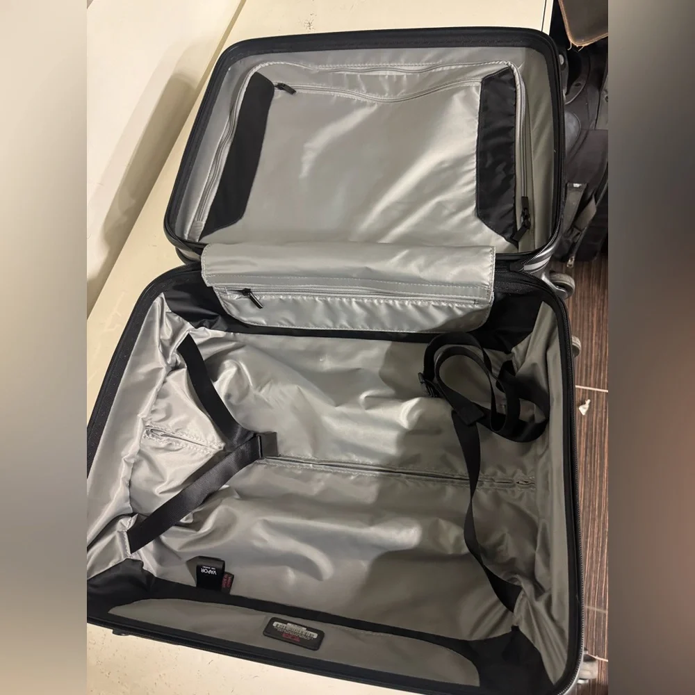 Tumi Vapor Silver and Black Hardside Spinner Carry-On